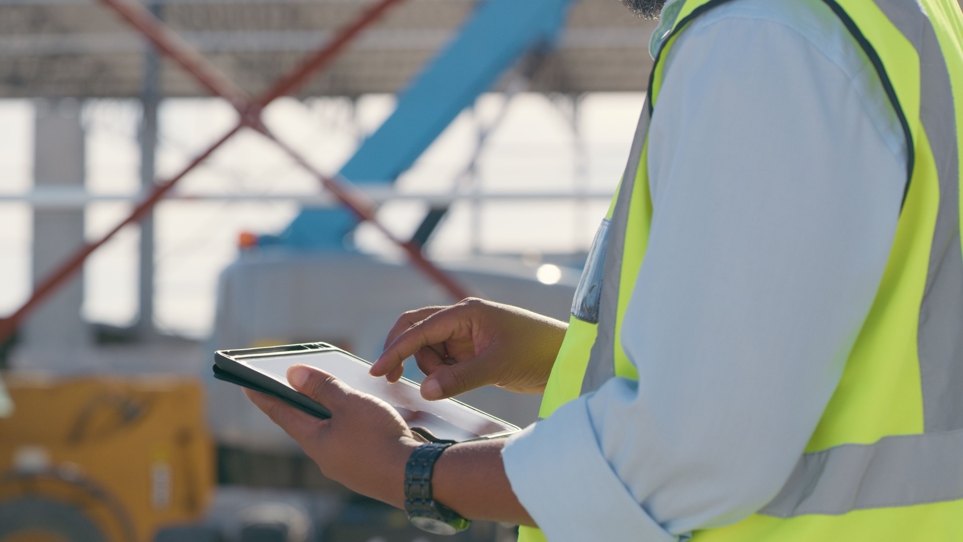 Hands, construction and tablet at site for project management, building logistics or app. Closeup of person and engineering worker on digital technology at industrial architecture design